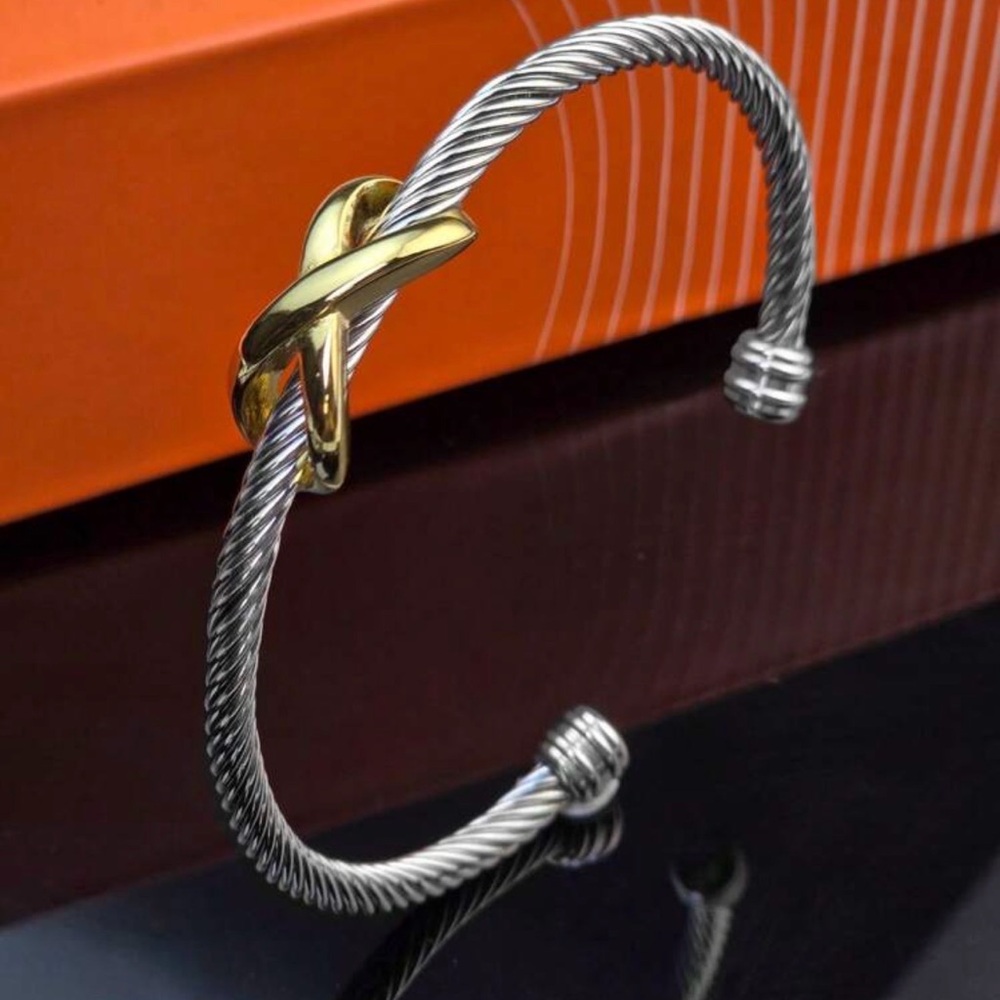 Silver Cable Cuff Bracelet with Gold Infinity Knot Accent